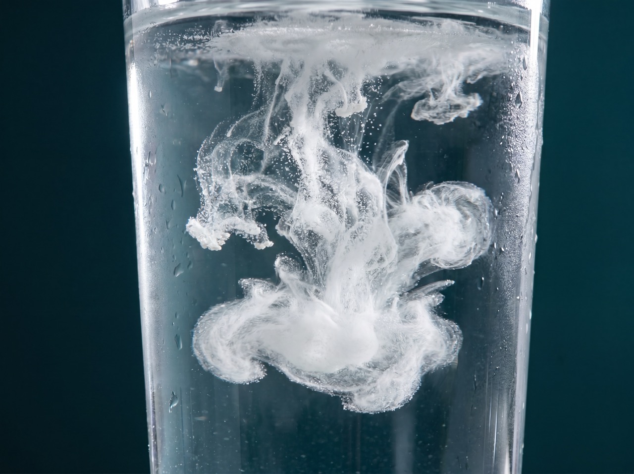 Dissolved in a glass